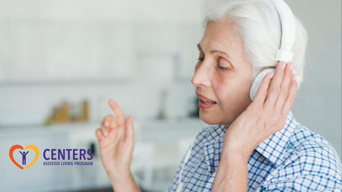 Music Therapy Sessions: Benefits for Senior Wellness 1 An elderly listining to music