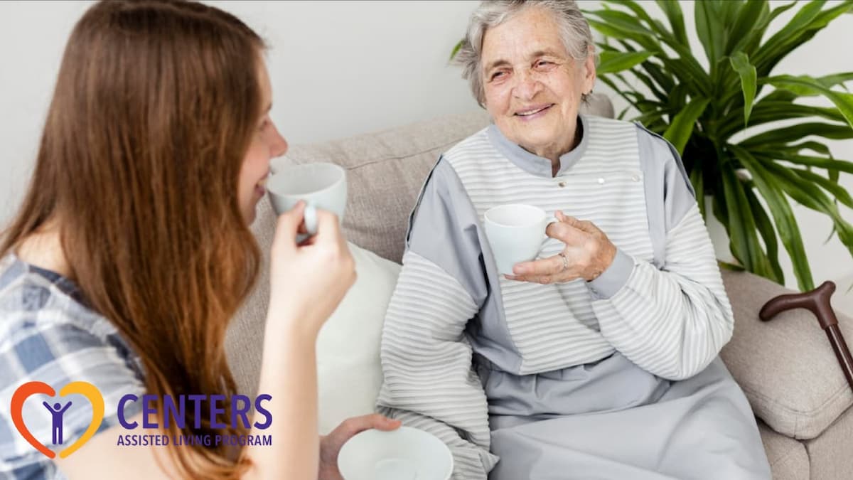 a woman holding cups of tea and smiling