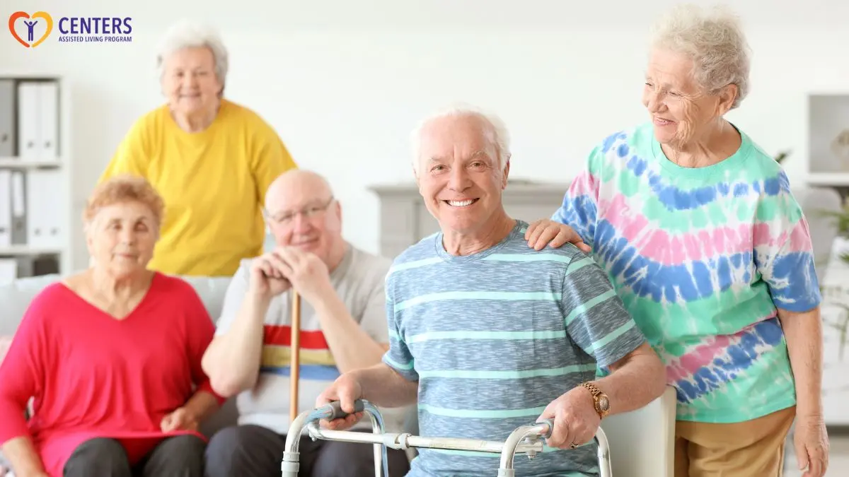 assisted-living-residents-smiling-group-photo-with-walker-support